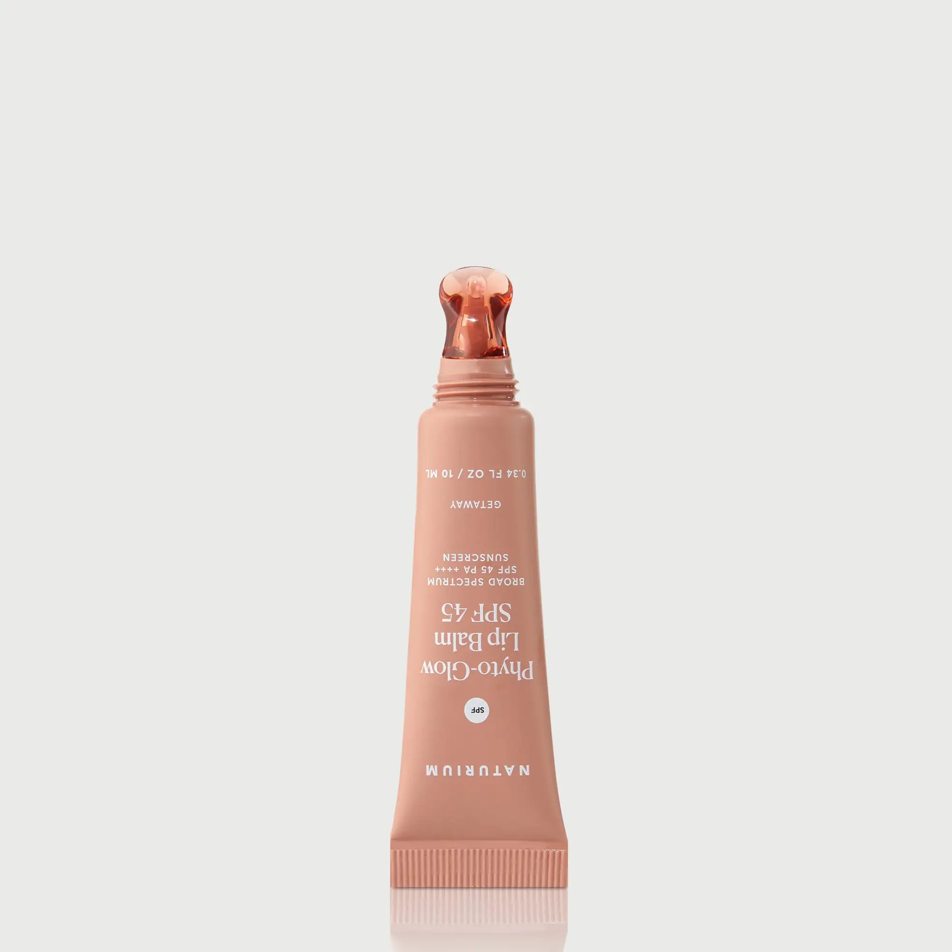 phyto-glow-lip-balm-spf-45-getaway-g6 NATR-10126_PhytoGlow_SPF_Getaway_primary_nocap_bonebkgd_1.webp