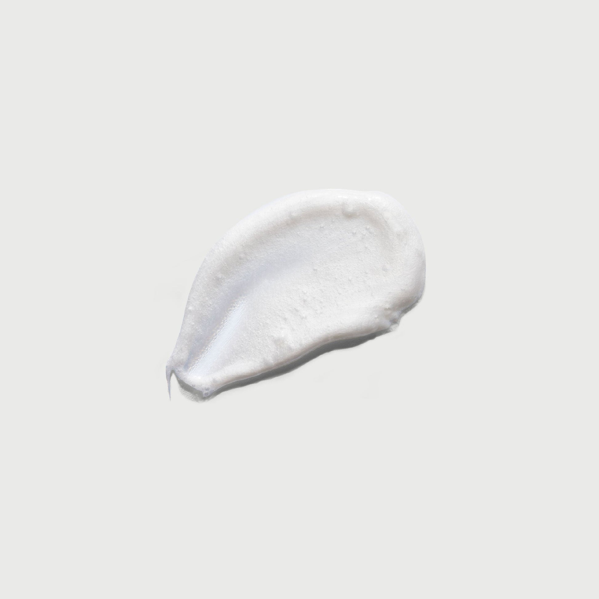 the-smoother-glycolic-acid-exfoliating-body-wash-f9 NATR-40002-Swatch-The-Smoother-Glycolic-Acid-Exfoliating-Body-Wash-bonebkgd.jpg