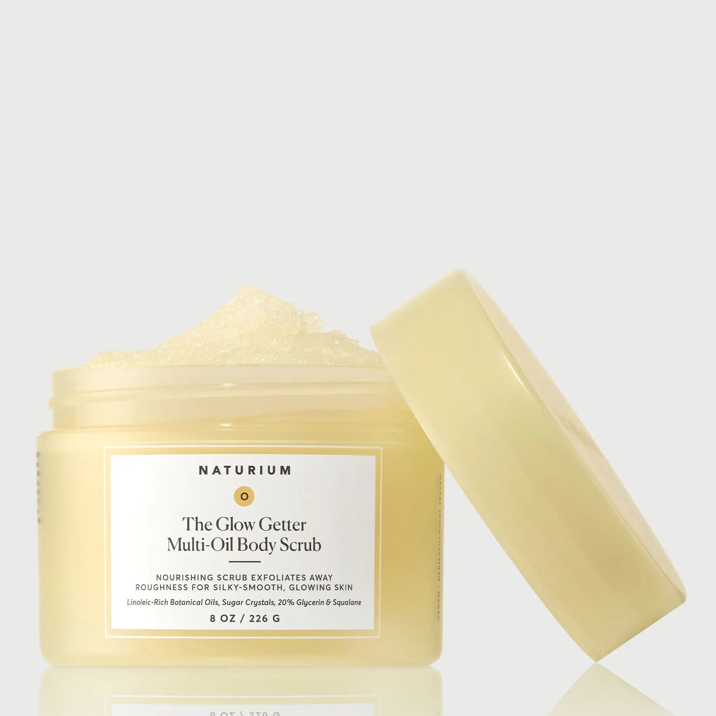 the-glow-getter-multi-oil-body-scrub-r9 NATR-40028-GlowGetter-Multi-Oil-Body-Scrub-Front-CapOff-bonebkgd.webp