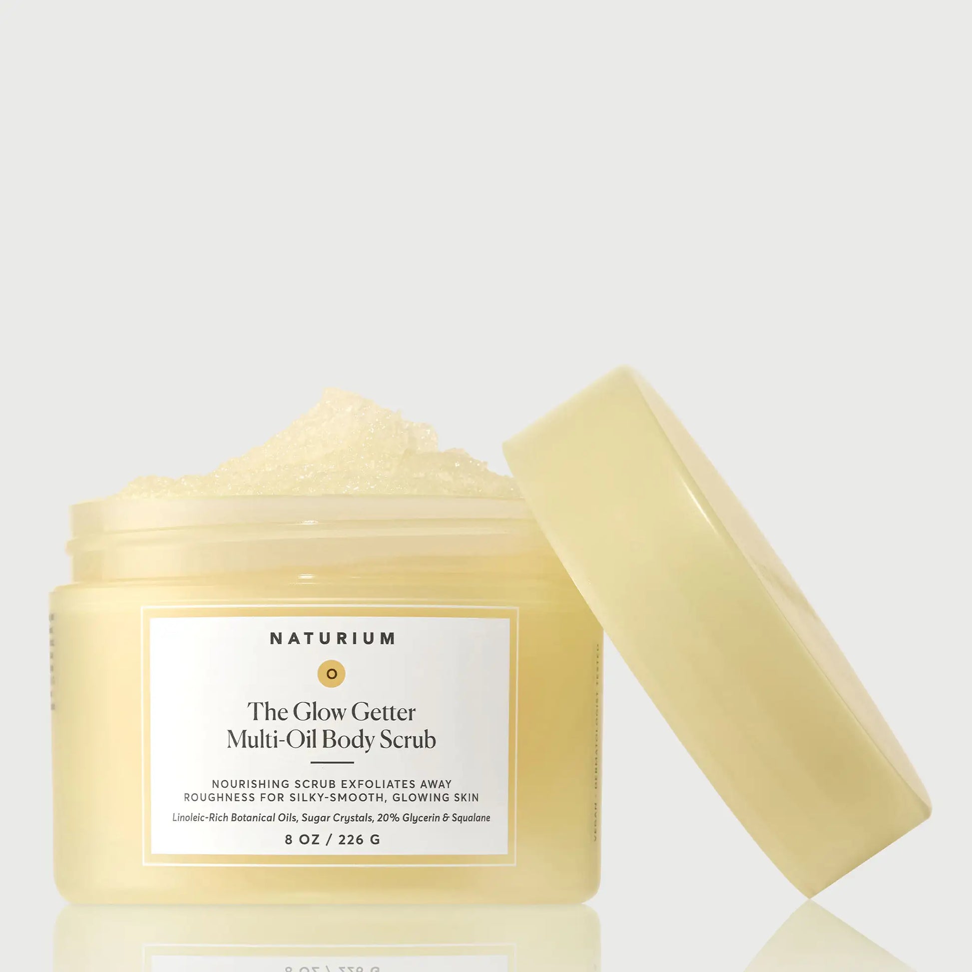 the-glow-getter-multi-oil-body-scrub-a6 NATR-40028-GlowGetter-Multi-Oil-Body-Scrub-Front-CapOff-bonebkgd.webp