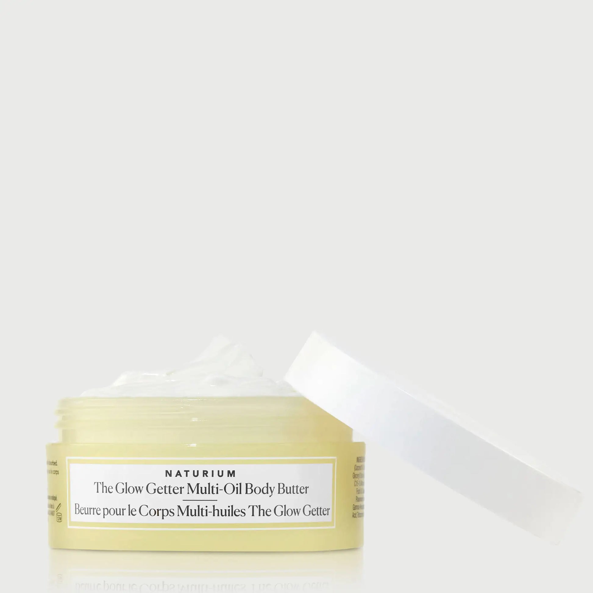 the-glow-getter-multi-oil-body-butter-travel-size-n0 NATR-40115_Glow-Getter-Body-Butter-Mini_front_capoff_bonebkgd.webp