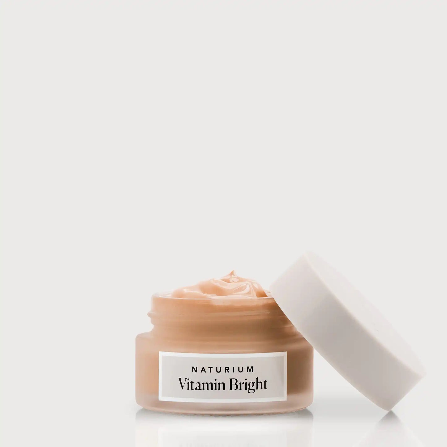 vitamin-bright-illuminating-eye-cream-z0 NATR-VitaminBright_DEEP_Primary_front_openjar_bone.webp